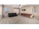 Living room with two sofas and neutral walls and carpet flooring at 11841 W Laurel Ln, El Mirage, AZ 85335