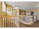View of second story open loft featuring views to the staircase at 12814 W Edgemont Ave, Avondale, AZ 85392