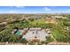 Aerial view of community pool, clubhouse, picnic area, sports fields, and residential homes in an Arizona community at 13131 N 153Rd Ave, Surprise, AZ 85379