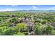 Stunning aerial view of a residential area with mountain views, pools, and lush greenery at 13131 N 153Rd Ave, Surprise, AZ 85379