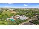 Aerial view of community pool, clubhouse, baseball field, and picnic area in a planned residential neighborhood at 13131 N 153Rd Ave, Surprise, AZ 85379