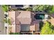 Aerial shot of a home with a tile roof and a backyard pool at 13131 N 153Rd Ave, Surprise, AZ 85379