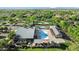 Community pool with an expansive area featuring pergolas and lounge seating at 13131 N 153Rd Ave, Surprise, AZ 85379