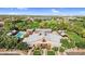 Community center and pool surrounded by lush landscaping and neighborhood views at 13131 N 153Rd Ave, Surprise, AZ 85379