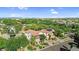 A stunning aerial view of a luxurious home with lush landscaping and a beautiful neighborhood at 13131 N 153Rd Ave, Surprise, AZ 85379