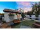 Inviting backyard oasis with well-manicured lawn, outdoor seating, and refreshing private pool at 13131 N 153Rd Ave, Surprise, AZ 85379