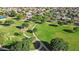 Aerial view of a community park with walking paths and lush green spaces at 13131 N 153Rd Ave, Surprise, AZ 85379