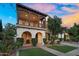 Beautiful two-story home features a balcony and elegant curb appeal at 13131 N 153Rd Ave, Surprise, AZ 85379