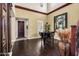 Elegant foyer featuring hardwood floors, grand piano, and high ceilings at 13131 N 153Rd Ave, Surprise, AZ 85379