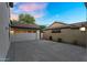 Clean 2-car garage with large driveway and exterior lighting at 13131 N 153Rd Ave, Surprise, AZ 85379
