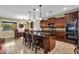 Gourmet kitchen with granite countertops, custom cabinetry, and stainless steel appliances, perfect for culinary enthusiasts at 13131 N 153Rd Ave, Surprise, AZ 85379