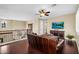 Cozy upstairs living area with hardwood floors and a comfortable sofa at 13131 N 153Rd Ave, Surprise, AZ 85379