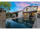 Stunning backyard oasis with a sparkling pool, lush landscaping, and ample space for outdoor entertaining and relaxation at 13131 N 153Rd Ave, Surprise, AZ 85379