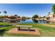 Water view showcasing scenic landscaping and peaceful community views, highlighting tranquil waterfront living at 1350 E Vaughn Ave, Gilbert, AZ 85234