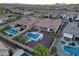 Aerial view of backyard pool and outdoor kitchen in desert setting at 14979 S 184Th Ave, Goodyear, AZ 85338