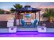 This outdoor gazebo with a grill and TV offers the perfect spot to unwind and enjoy the outdoors at 14979 S 184Th Ave, Goodyear, AZ 85338