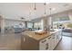 Bright kitchen with a large island, modern finishes, and seamless access to the outdoor patio at 14979 S 184Th Ave, Goodyear, AZ 85338