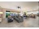 Bright living room with tile floors and a view of the backyard at 14979 S 184Th Ave, Goodyear, AZ 85338