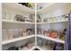 Well-stocked pantry with organized shelving, providing ample storage space at 14979 S 184Th Ave, Goodyear, AZ 85338