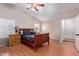 Comfortable bedroom with a ceiling fan, and a queen-sized bed, offering a relaxing retreat at 1560 E Flint St, Chandler, AZ 85225