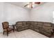 A spacious living room features a plush sectional sofa and neutral color scheme, creating a comfortable and inviting atmosphere at 1560 E Flint St, Chandler, AZ 85225