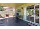 Inviting covered patio with sliding glass doors offers seamless indoor-outdoor living and entertaining space at 1560 E Flint St, Chandler, AZ 85225