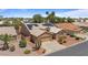 Single Gathering home with a two-car garage, neutral exterior, and mature desert landscaping at 15774 W Indianola Dr # Six, Goodyear, AZ 85395
