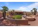 Enjoy this spacious backyard with multiple seating areas and desert landscaping at 15774 W Indianola Dr # Six, Goodyear, AZ 85395