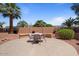 Backyard features a dining area, desert landscaping and a spacious patio at 15774 W Indianola Dr # Six, Goodyear, AZ 85395
