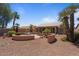 Spacious backyard includes mature landscaping and an outdoor seating area at 15774 W Indianola Dr # Six, Goodyear, AZ 85395