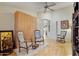 Bright living room with hardwood floors and comfortable seating arrangement at 15774 W Indianola Dr # Six, Goodyear, AZ 85395
