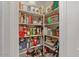 Walk-in pantry offering ample storage space for kitchen essentials and supplies at 15774 W Indianola Dr # Six, Goodyear, AZ 85395