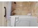 Accessible bathroom with walk-in tub and tiled shower, providing safety and comfort at 15774 W Indianola Dr # Six, Goodyear, AZ 85395