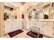 Bright bathroom with dual vanities, elegant light fixtures, and ample counter space at 17323 E Teal Dr, Fountain Hills, AZ 85268