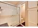 Modern bathroom with a glass-enclosed shower and white tile, offering a clean and refreshing space at 17323 E Teal Dr, Fountain Hills, AZ 85268