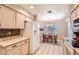 Open kitchen with a dining area, featuring modern appliances and a cozy spot for enjoying meals at 17323 E Teal Dr, Fountain Hills, AZ 85268