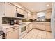 Bright kitchen with modern appliances and a tile backsplash, providing a functional and stylish cooking space at 17323 E Teal Dr, Fountain Hills, AZ 85268