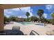 Community pool with palm trees, lounge chairs, and a covered gazebo at 17323 E Teal Dr, Fountain Hills, AZ 85268