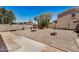 Desert backyard with rock ground cover and concrete patios at 18475 N Madison Rd, Maricopa, AZ 85139