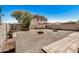 Low maintenance backyard with rock ground cover and concrete patios at 18475 N Madison Rd, Maricopa, AZ 85139