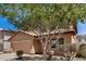 Charming two-story home featuring a two-car garage and low-maintenance desert landscaping at 18475 N Madison Rd, Maricopa, AZ 85139