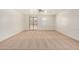 Spacious primary bedroom with plush carpeting, neutral walls, ceiling fan, and natural light at 18475 N Madison Rd, Maricopa, AZ 85139