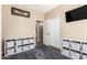 Well-organized bedroom featuring carpet and built-in storage at 1926 S Longspur Ln, Gilbert, AZ 85295