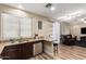 Open floor plan featuring a seamless transition from kitchen to living room at 1926 S Longspur Ln, Gilbert, AZ 85295