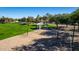 Park showcasing a volleyball court, shaded picnic area, and walking paths for community residents at 1926 S Longspur Ln, Gilbert, AZ 85295