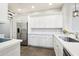 Stylish kitchen featuring white cabinets, stainless steel appliances, and quartz countertops for a clean, modern look at 19475 N Grayhawk Dr # 1128, Scottsdale, AZ 85255