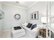 Comfortable living room with neutral tones, plush seating, and decorative accents for relaxation at 19475 N Grayhawk Dr # 1128, Scottsdale, AZ 85255