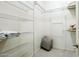 Spacious walk-in closet with ample shelving and storage solutions for organization at 19475 N Grayhawk Dr # 1128, Scottsdale, AZ 85255