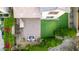 The backyard features pavers, a fire pit, a lush garden, and manicured landscaping at 21602 N 36Th St, Phoenix, AZ 85050