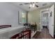 Bright bedroom with hardwood floor, a desk, and plenty of natural light at 21602 N 36Th St, Phoenix, AZ 85050
